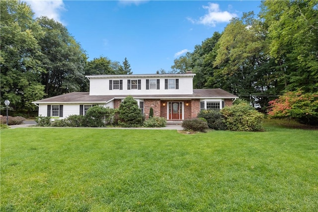 view of front of home featuring a front yard