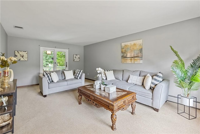 living room featuring light colored carpet