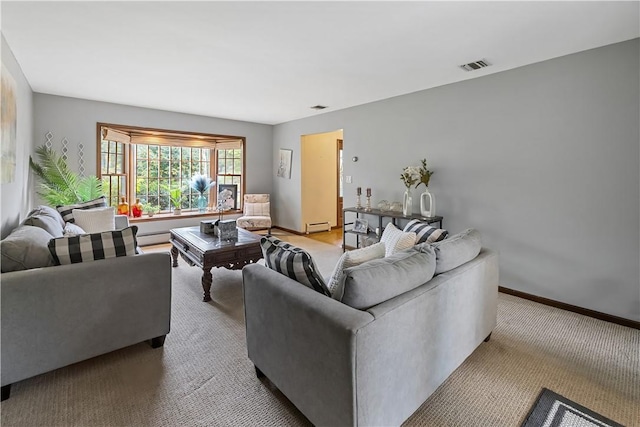 living room featuring carpet and baseboard heating