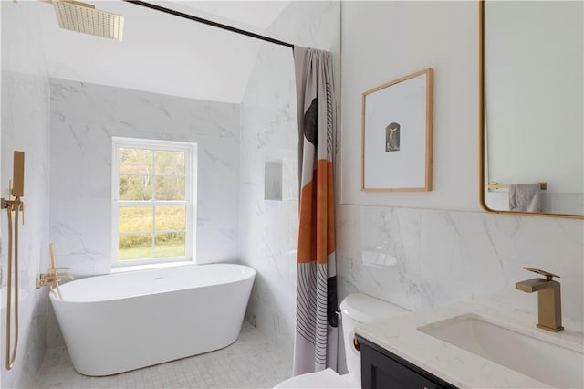 bathroom featuring a tub to relax in, vanity, tile walls, tile patterned flooring, and toilet