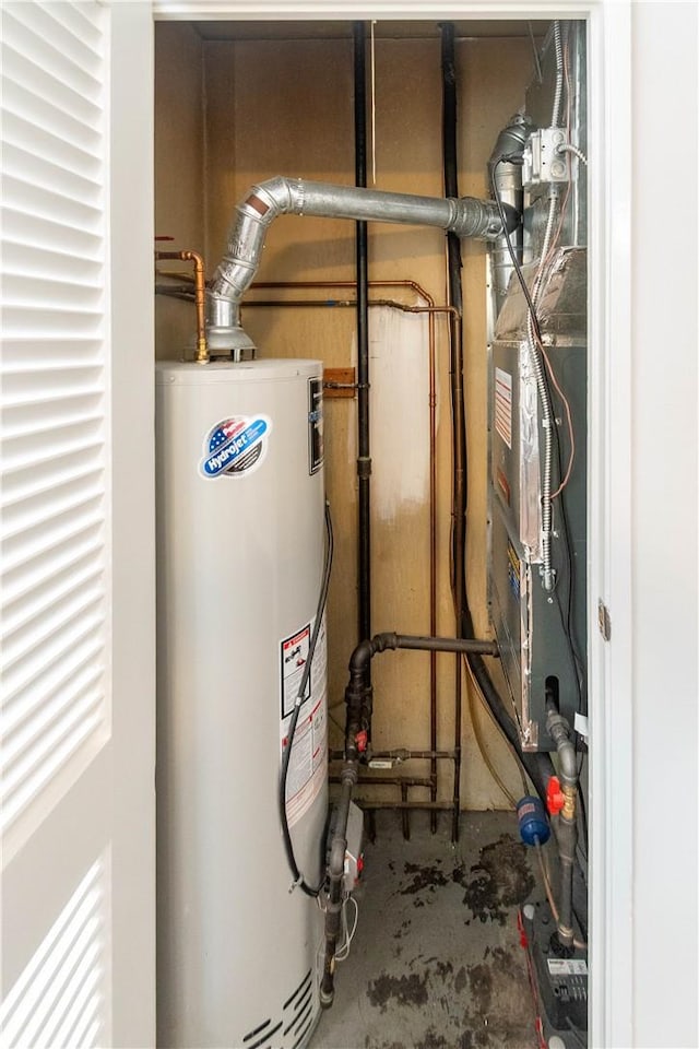 utility room with gas water heater