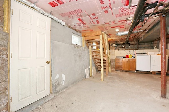 basement with separate washer and dryer