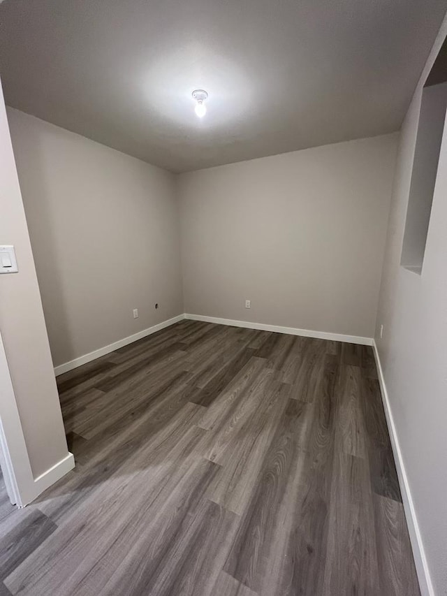 empty room featuring dark hardwood / wood-style floors