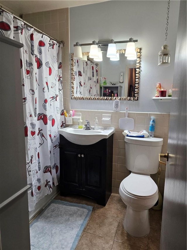 bathroom with tile walls