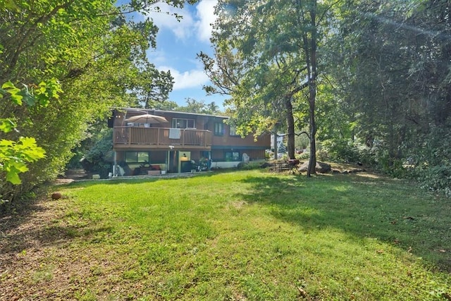 view of yard with a deck