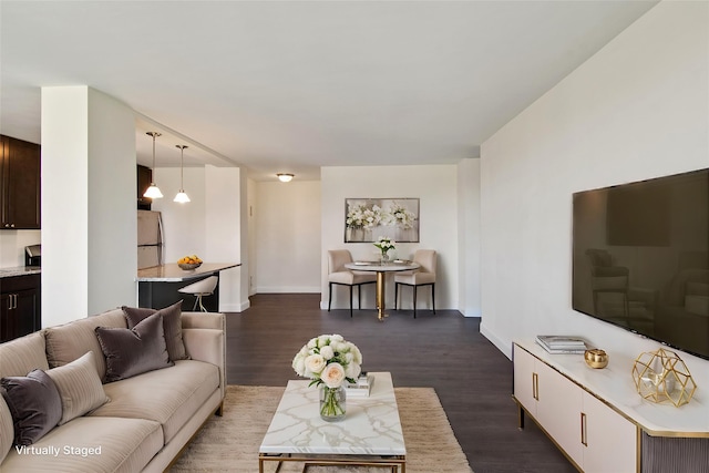 living room featuring dark hardwood / wood-style flooring