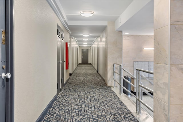 hallway featuring tile walls