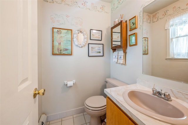210 Bulsontown Rd, Stony Point, NY 10980 - half bathroom featuring baseboard heating, vanity, and tile patterned flooring