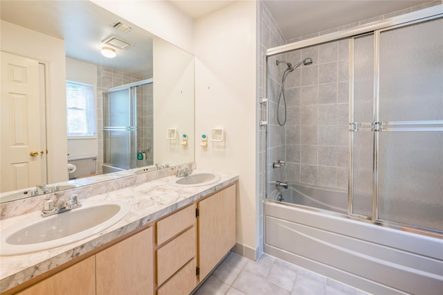 210 Bulsontown Rd, Stony Point, NY 10980 - bathroom with bath / shower combo with glass door, tile patterned flooring, and double vanity