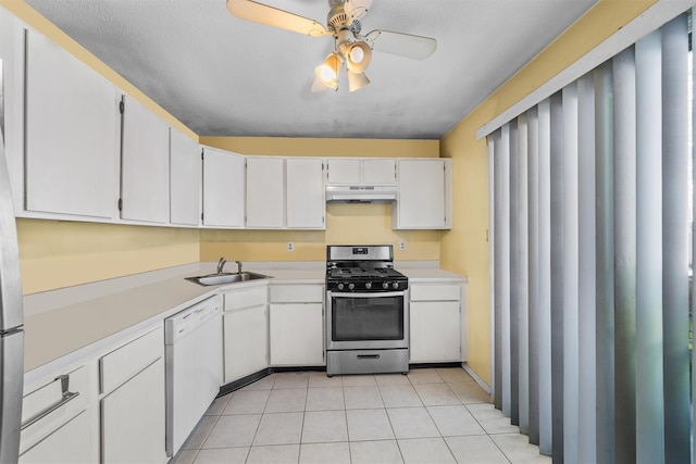 kitchen featuring gas stove, white cabinetry, sink, and white dishwasher