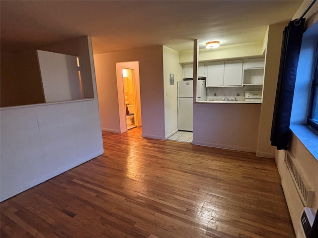 2545 Sedgwick Ave Unit 6F, Bronx, NY 10468 - unfurnished living room with wood finished floors