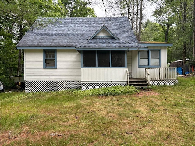 view of front of home with a front yard