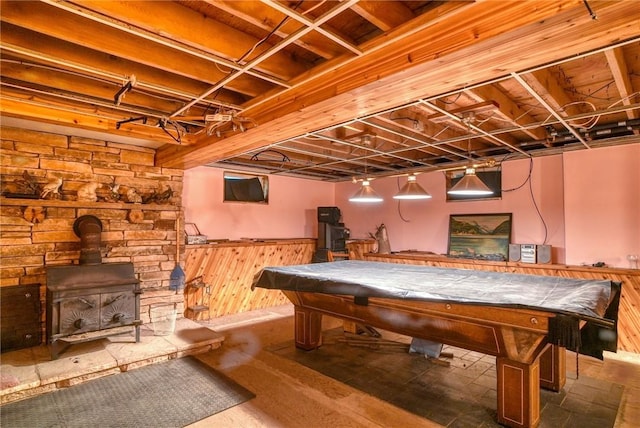 rec room featuring a wood stove and pool table