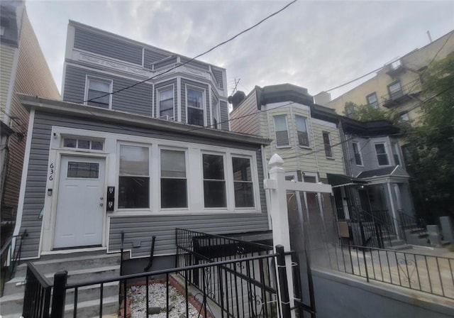 636 E 230th St, Bronx, NY 10466 - view of front of house with a fenced front yard and entry steps