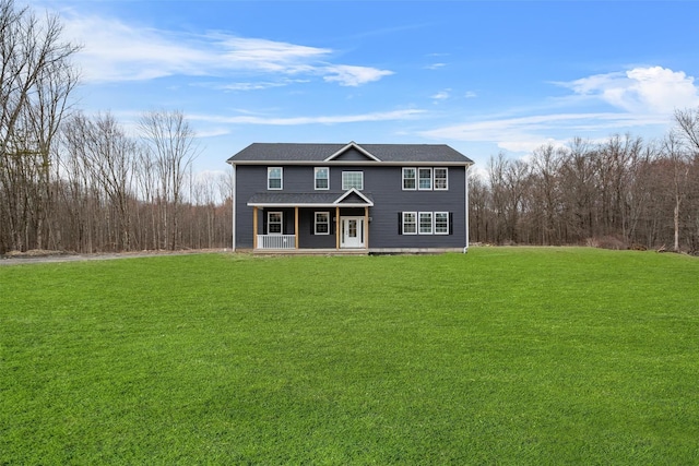 view of front facade featuring a front lawn and a porch