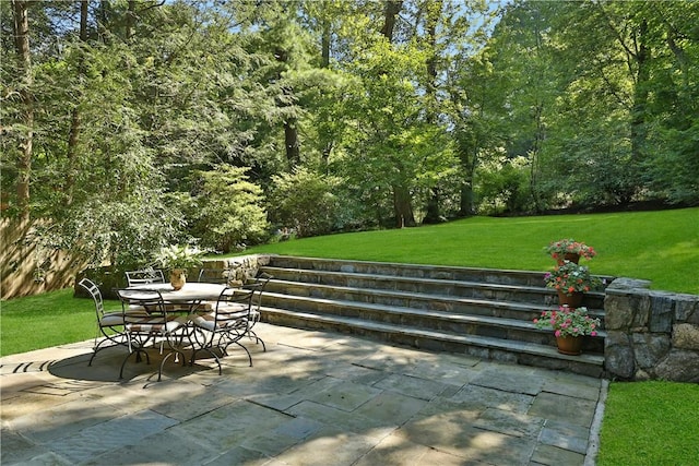 view of patio featuring outdoor dining space