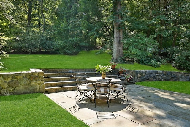 view of patio featuring outdoor dining space