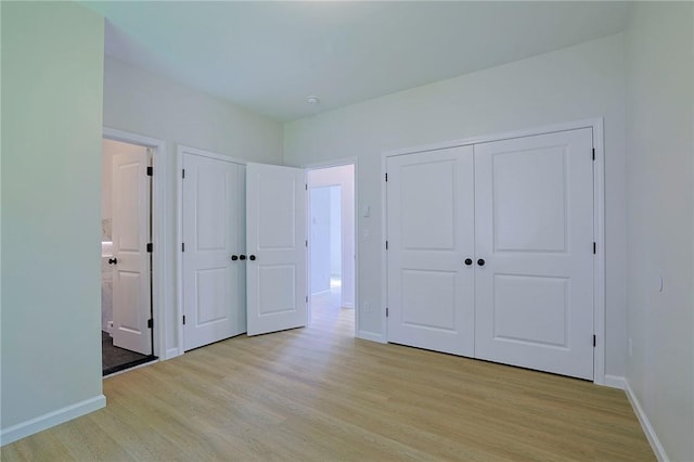 unfurnished bedroom featuring light hardwood / wood-style floors