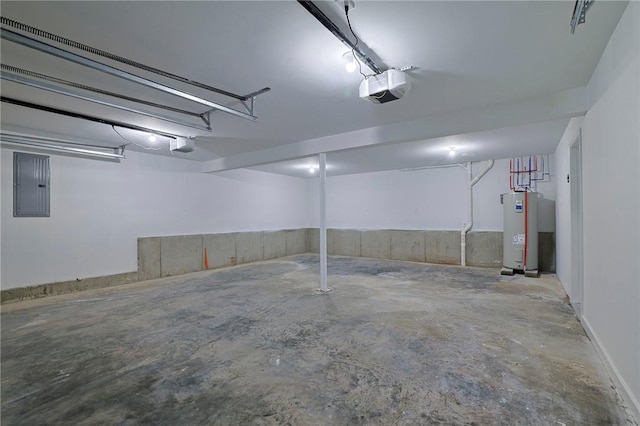 garage featuring electric water heater, electric panel, and a garage door opener