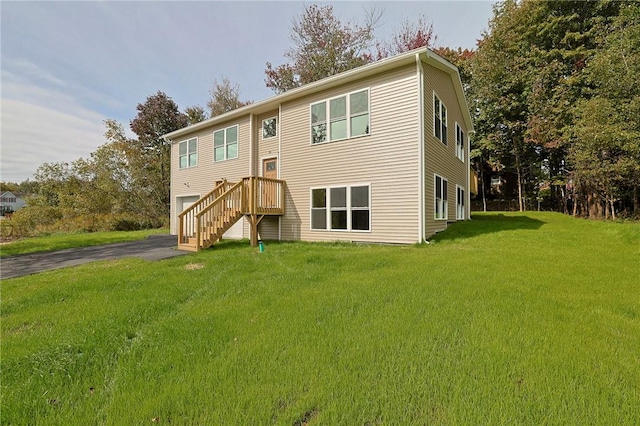 raised ranch featuring a front yard