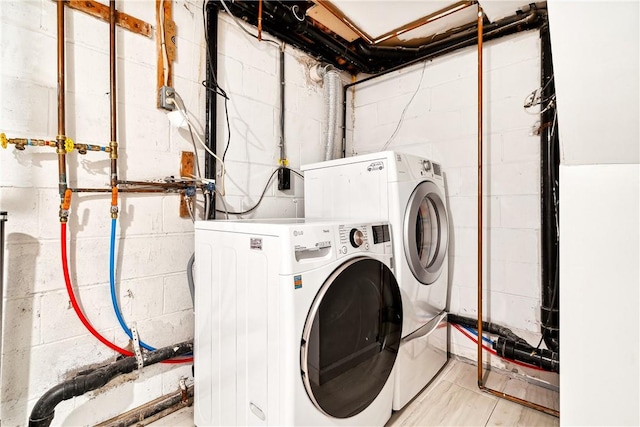 laundry area with washer and clothes dryer