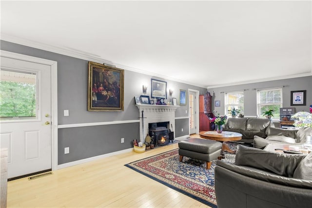67 Myers Corners Rd, Wappingers Falls, NY 12590 - living area featuring wood-type flooring, crown molding, and baseboards