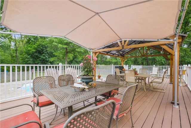 wooden terrace with a gazebo