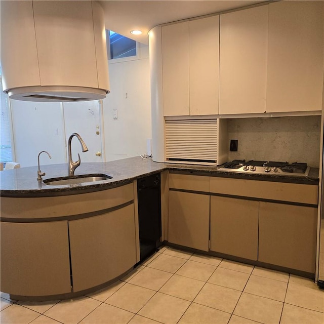 kitchen with sink, tasteful backsplash, white gas stovetop, kitchen peninsula, and light tile patterned flooring