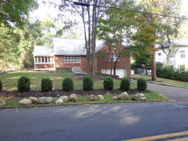 single story home with a garage