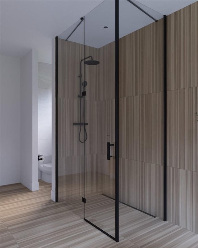 bathroom with tile walls and tiled shower