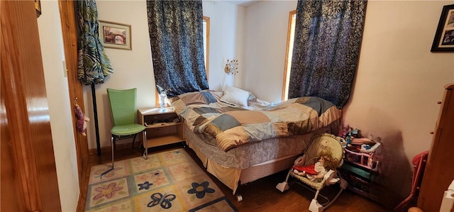 bedroom featuring hardwood / wood-style floors