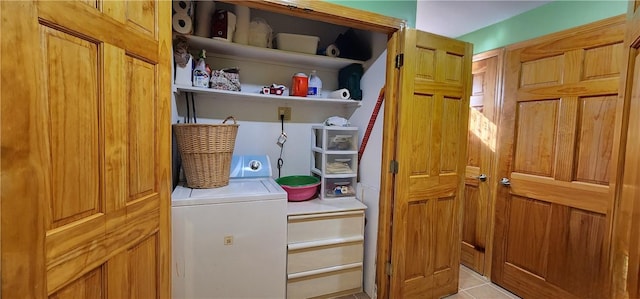 washroom with light tile patterned floors and washer / clothes dryer