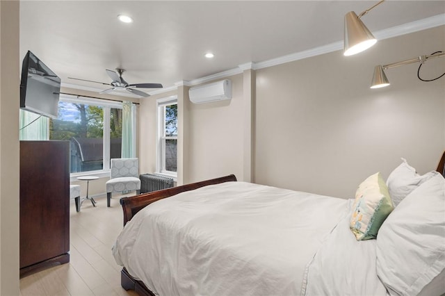 bedroom featuring a wall mounted air conditioner, ceiling fan, light wood-type flooring, ornamental molding, and radiator heating unit