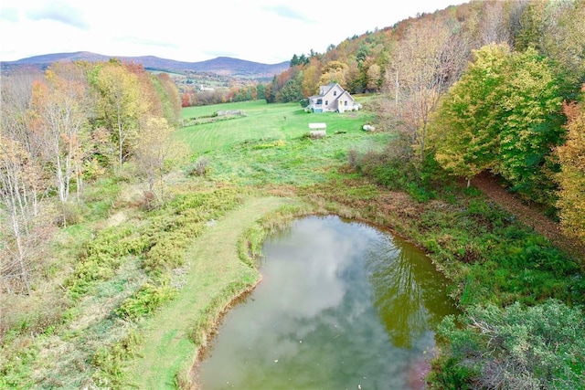 bird's eye view featuring a water and mountain view