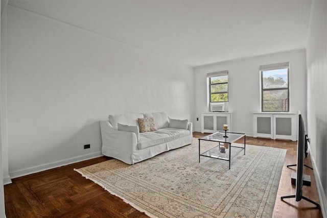 living room featuring parquet flooring