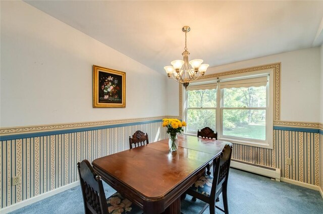 carpeted dining room with vaulted ceiling, baseboard heating, and a notable chandelier