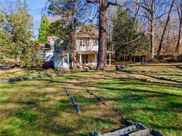 view of front of house with a front lawn