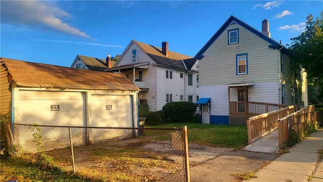 rear view of house with a lawn