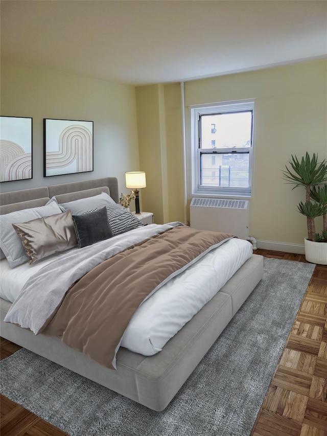 bedroom with dark parquet flooring and radiator