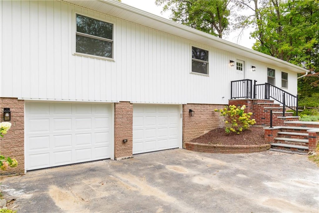 split foyer home featuring a garage