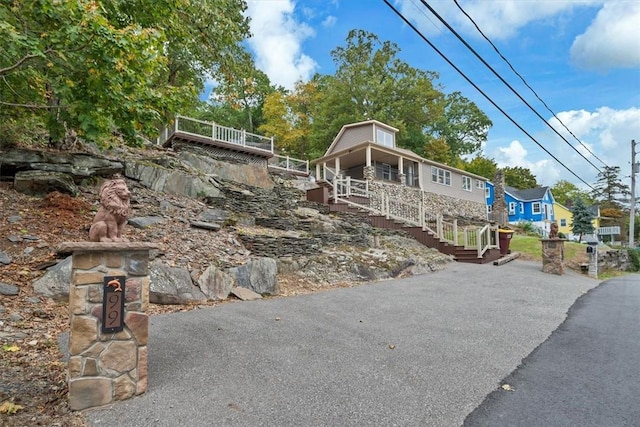 view of front of home featuring covered porch