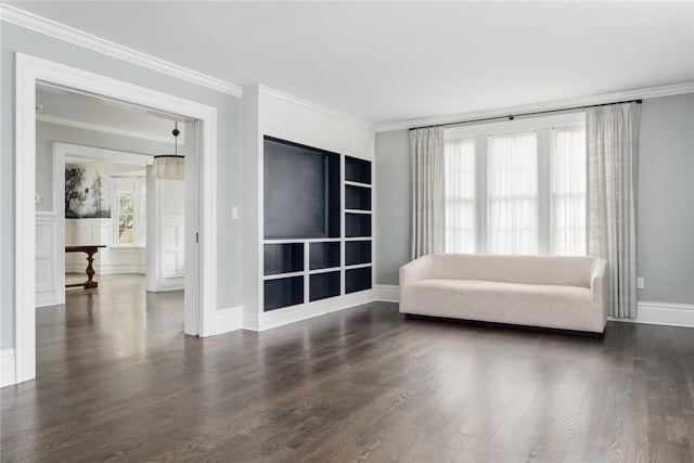 unfurnished room with crown molding and dark wood-type flooring