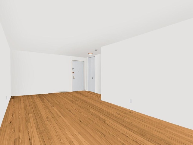 empty room with light wood-type flooring