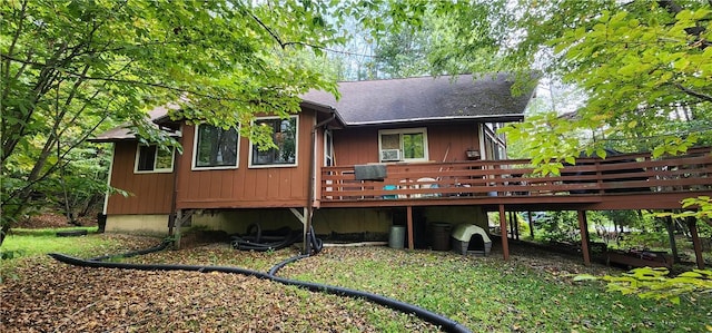 rear view of house with a deck