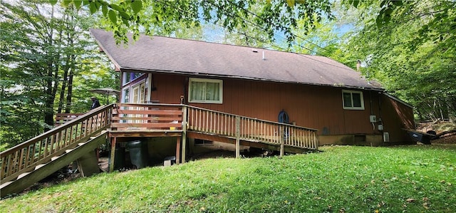38 Winterthur Rd, Woodridge, NY 12789 - back of house featuring a shingled roof, a deck, a yard, and stairway