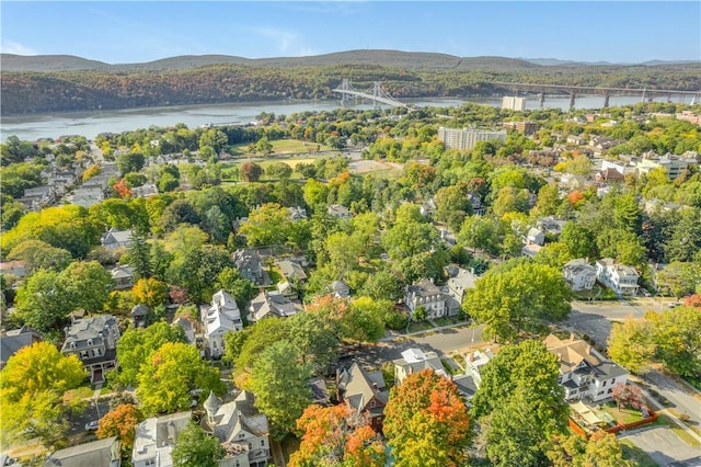 aerial view featuring a water and mountain view