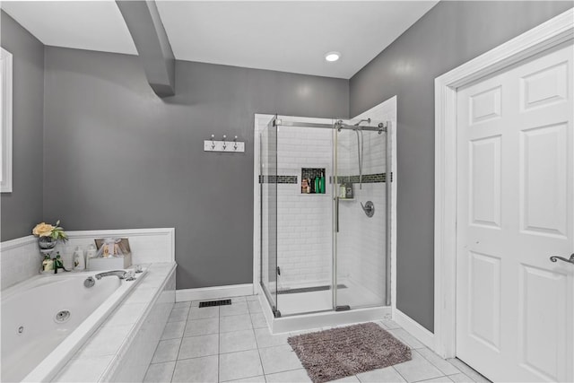 bathroom with shower with separate bathtub and tile patterned floors