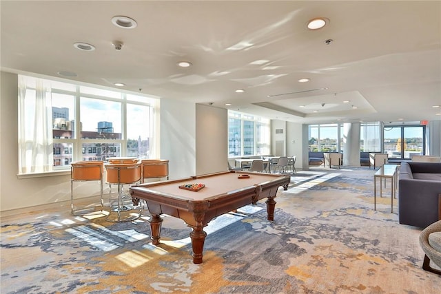 playroom with a raised ceiling, carpet floors, and billiards