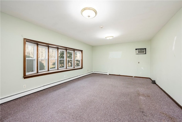 carpeted spare room with a wall mounted AC and a baseboard radiator