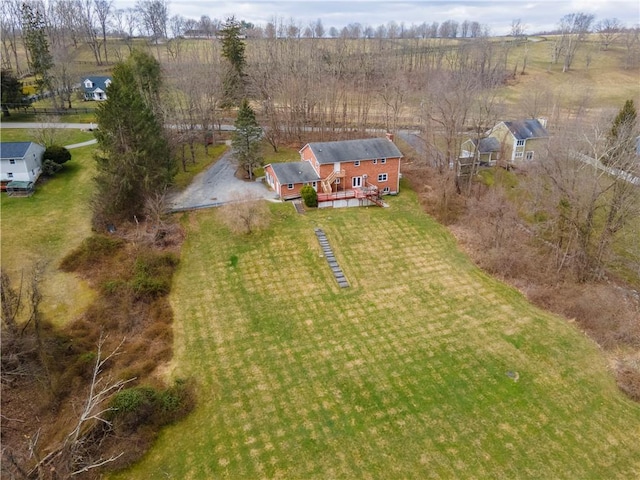 birds eye view of property featuring a rural view